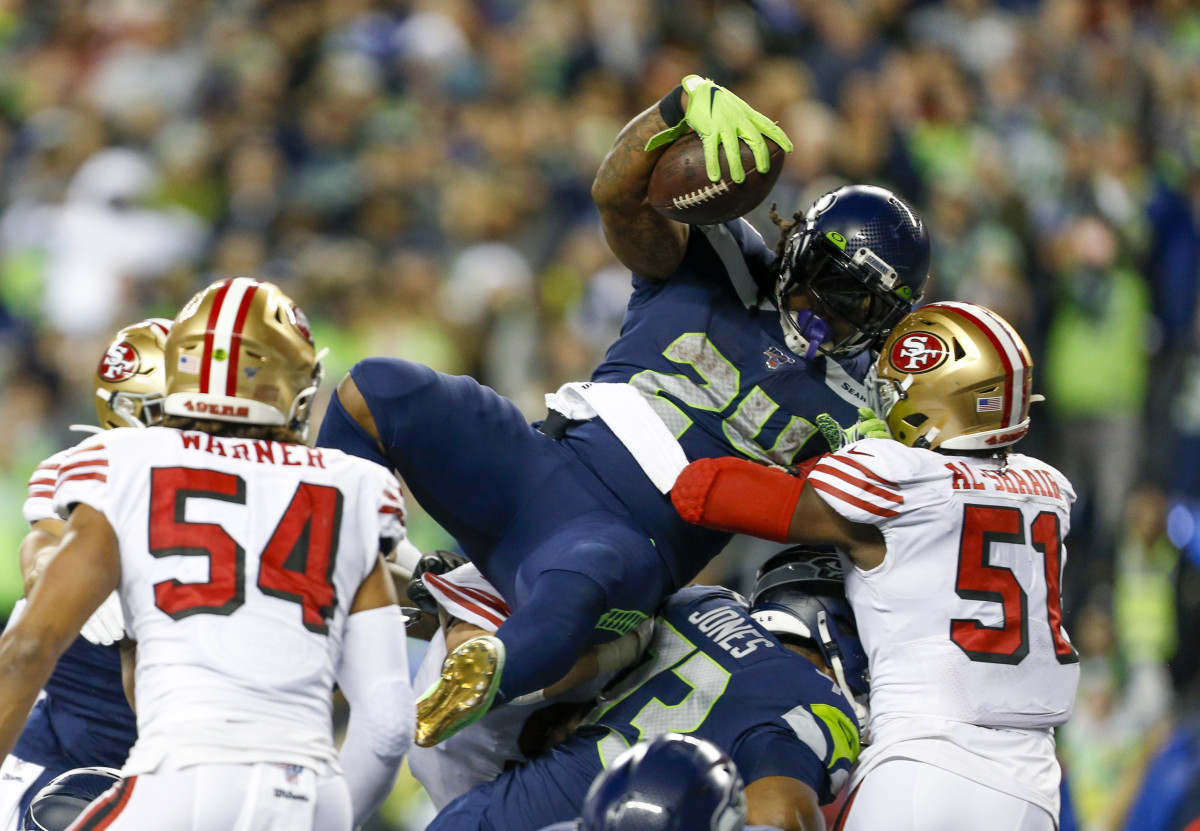 Seattle Seahawks running back Marshawn Lynch (24) rushes for a touchdown against the San Francisco 49ers during the fourth quarter at CenturyLink Field